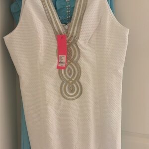 Elegant White Dress with Gold Embellishments